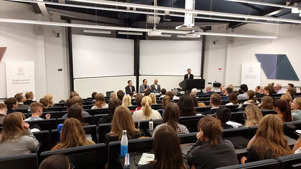 The Eden auditorium full of students during panel discussion on US elections 2024