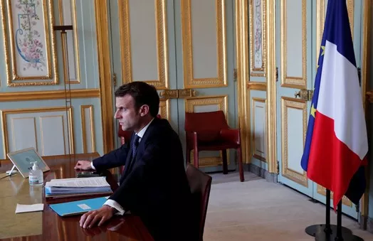 En bild från ett videomöte med Frankrikes president Emmanuel Macron i Elyséepalatset. Foto.